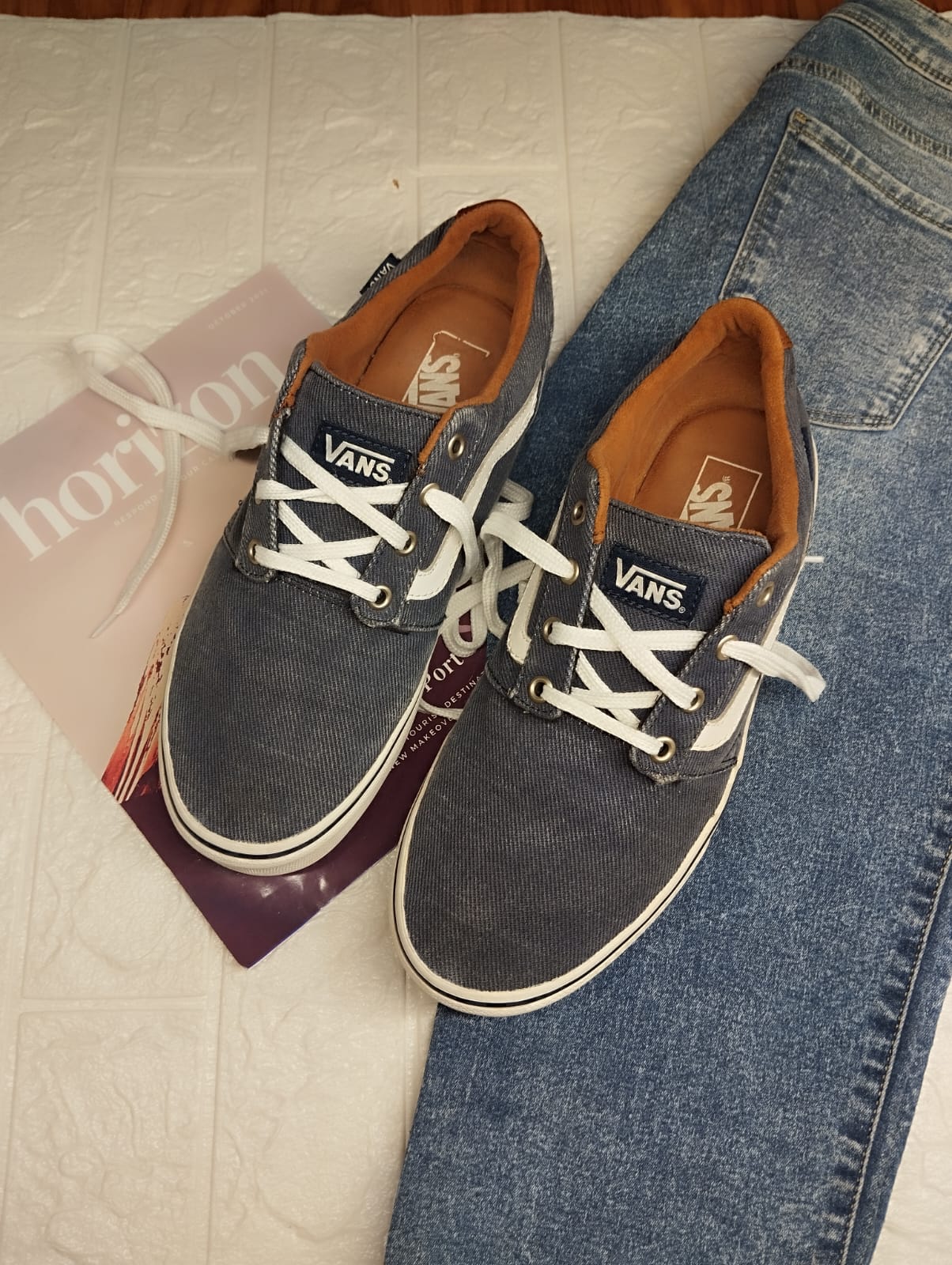 Black and brown low rise vans